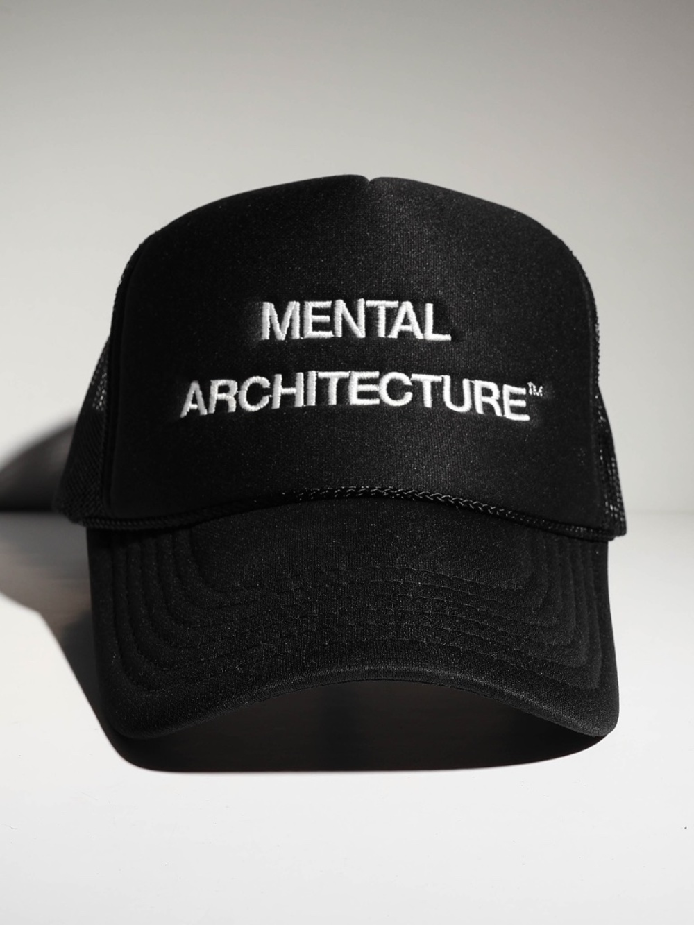 Amazing Mental Architecture Embroidered Logo Mesh Trucker Hat